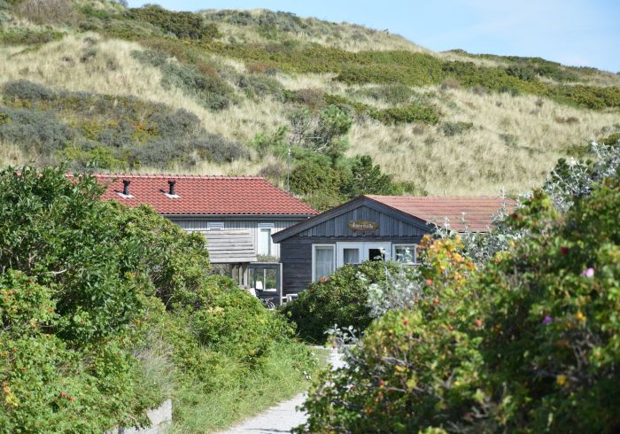 Fietsen door Duinkersoord, Wegwijs tussen de vakantiewoningen op Vlieland